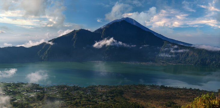 Bali. Panoramic shot of Agung volcano at morning cloudscape
