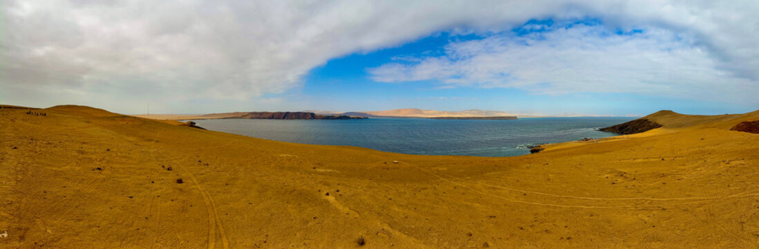 Peru, South America: breathtaking aerial and panoramic view of Playa Lagunilla de las Algas, one of the most famous beaches in Paracas National Reserve, protected natural area on the southern coast