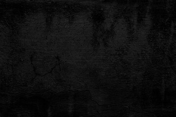  Textura de pared de hormigón grunge negro con grietas erosionadas. Superficie de pared envejecida oscura con grietas sutiles. Evoca misterio, decadencia y crudeza urbana. © C.Castilla