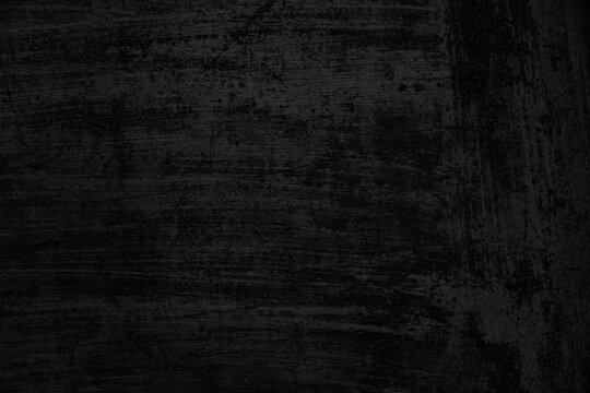  Textura de pared pintada de negro oscuro, superficie de fondo rugosa. Pared negra rugosa con textura pintada. Representa audacia, misterio y est&eacute;tica oscura minimalista.