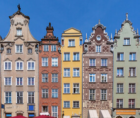 Fototapeta premium Colorful historic merchant houses with ornate facades along the Long Market in the historic center of Gdansk, Poland.