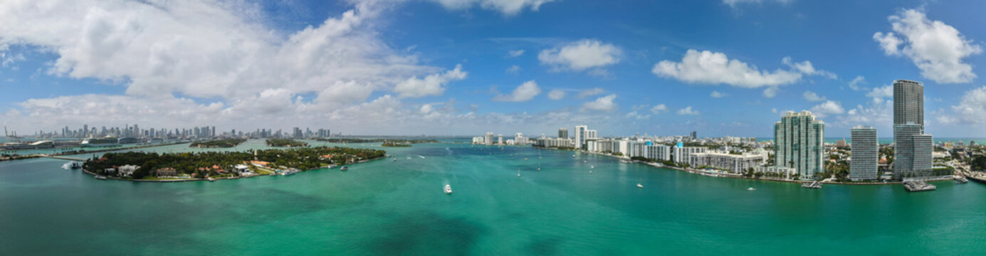 Panorama of Miami Beach with turquoise waters. Drone shot of Miami skyline. Top view of South Beach. Miami cityscape with luxury skyscrapers and ocean. View of Miami famous coastline.