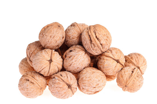 Walnuts are isolated on a white background,