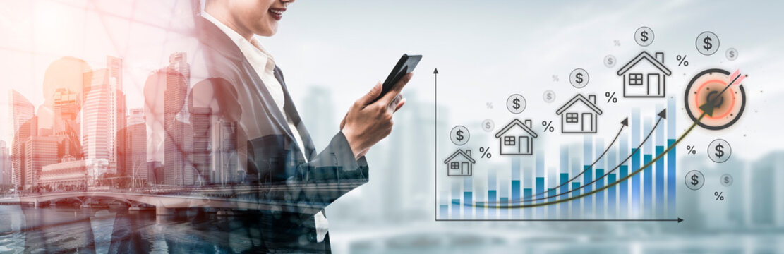 Business professional analyzes real estate market trends using smartphone while observing vibrant city skyline and financial growth charts. Bitwise.