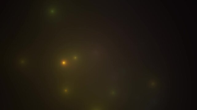 Glowing particles of light drift and twinkle in a dark, hazy atmosphere, evoking a sense of magic or cosmic wonder, abstract background element