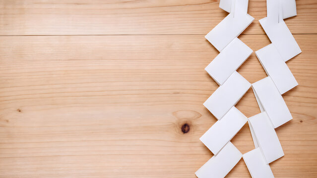 White Shide Paper Streamers on a Clean Cedar Surface