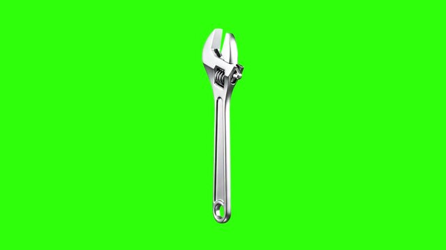 A metallic adjustable wrench hand tool standing vertically over a bright green screen background. Perfect for visual effects compositing in DIY home improvement videos, automotive repair tutorials, an