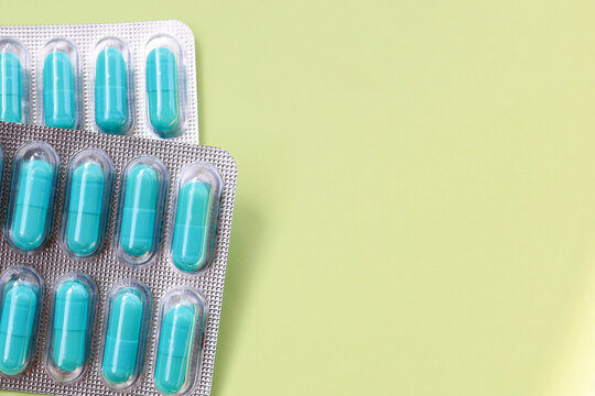 Blue capsules of Doxycycline in blister packs.
