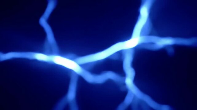 Abstract blue plasma electric bolts glowing on dark background