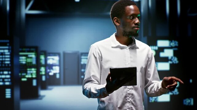 African American engineer supports AI computing in a data center, connecting artificial intelligence, machine learning workloads and large scale data processing during checkup server room.