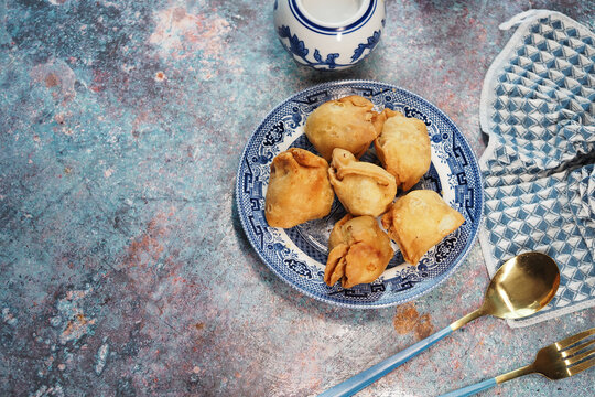 Delicious singara on a patterned plate ready for sharing