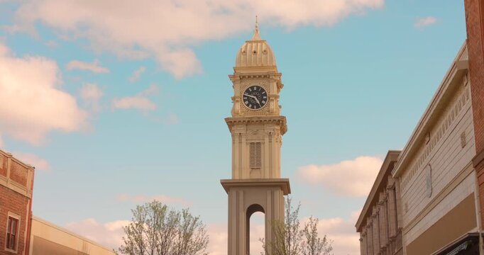 Town Clock In Downtown Dubuque, Iowa, USA. - tilt down shot