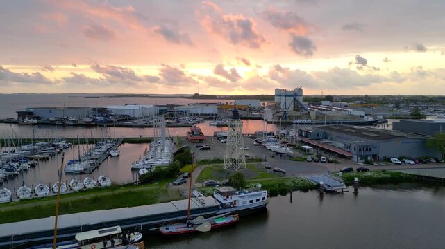 Aerial view of a marina sunset over the sea at Urk, Netherlands