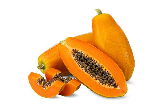 Close-up of Ripe Orange Flesh Papayas Whole and Cut on White Background
