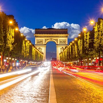 Triumphal Arch Illuminated at Night with Traffic Light Trails on a Parisian Street