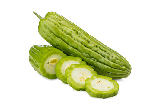 Close-up of Fresh Bitter Melon Whole and Sliced on White Background