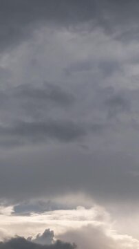 Dark storm clouds time-lapse, dramatic nature background for weather and climate news.