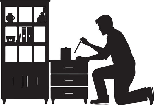 Silhouette of a man kneeling, using a tool on a chest