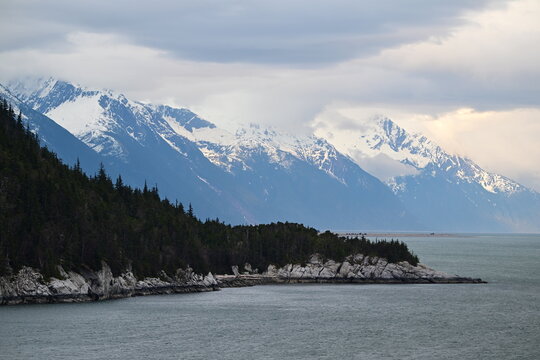 Amazing snow-capped peaks on mountains in the interior passage near Juneau, Alaska