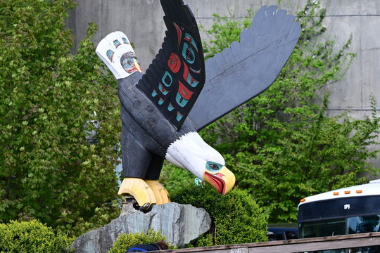 carved First Nations eagle totem style carving in a Ketchikan, Alaska park