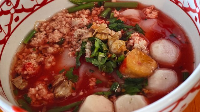 Pink Noodles (fermented bean curd sauce) with fish ball.