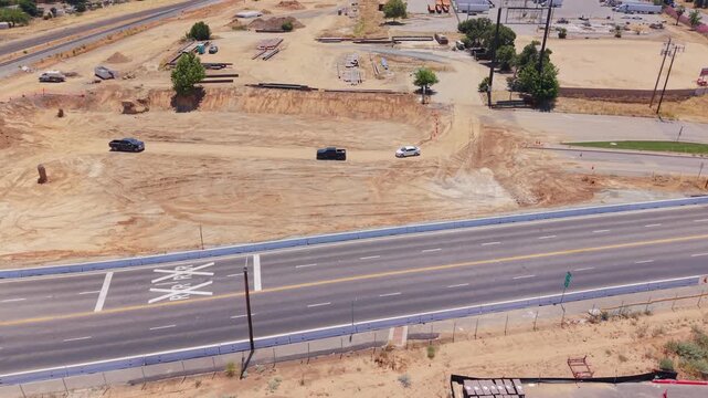 Still Aerial Drone Shot Over California High Speed Rail Construction With Manholes Dirt Piles and Road