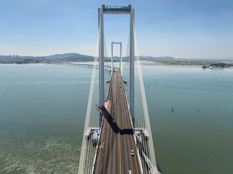 An aerial view shows Cheongna Sky Bridge and cities on the sea, incheon in republic of korea
