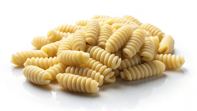 Two pieces of cavatelli pasta on white background