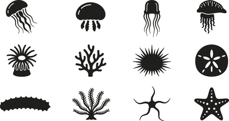 Set of black silhouette icons depicting various marine life and sea creatures. © Dhea