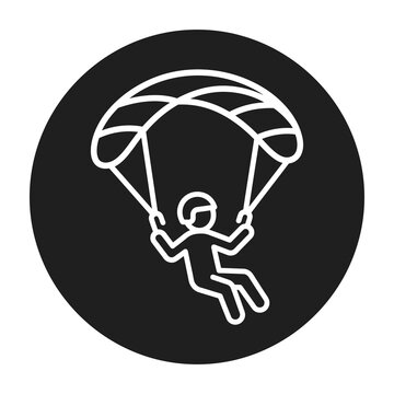 Parachutist jumping in air with open parachute