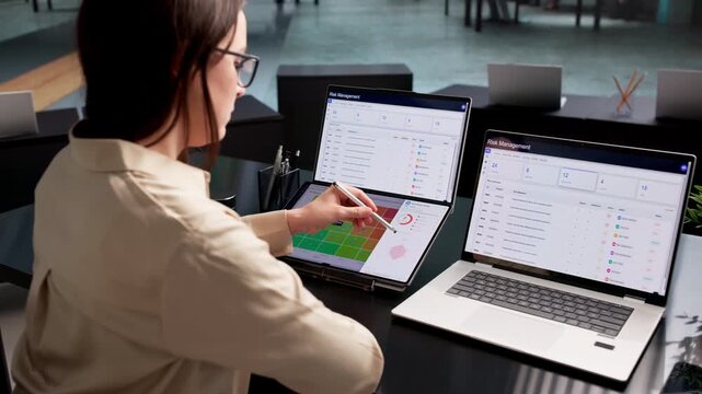 Vendor Manager Using Dual Touchscreen Laptops