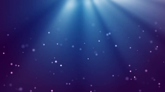 Abstract blue background with soft glowing light rays and floating particles.