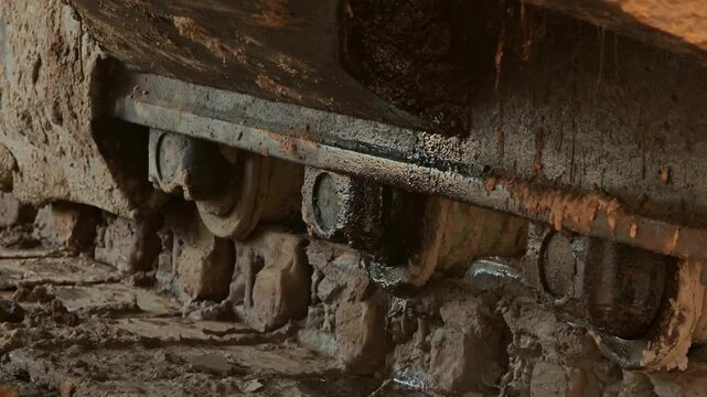 Excavator or Backhoe Undercarriage Parts. Roller, Rubber Track and Track Shoe.