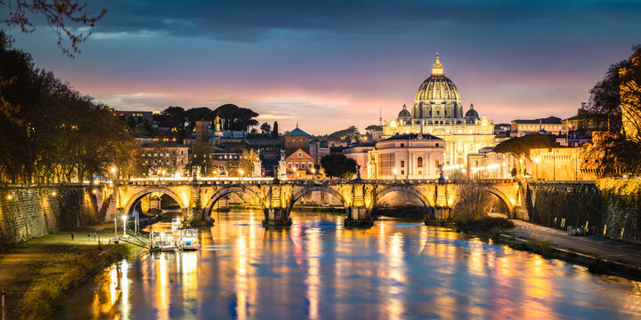 St Peter's Basilica and Ponte Sant'Angelo at twilight, Rome, Italy