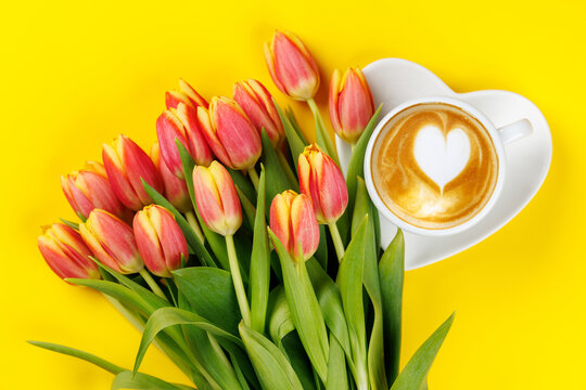 Coffee and fresh tulips