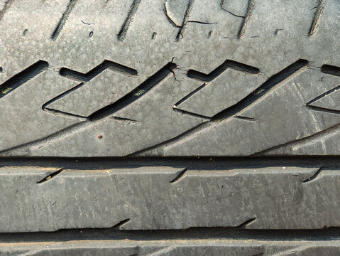 Close-up pattern of a rubber tire tread texture