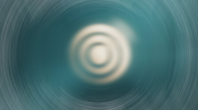 Circular light ripple effect with soft glowing center in deep teal