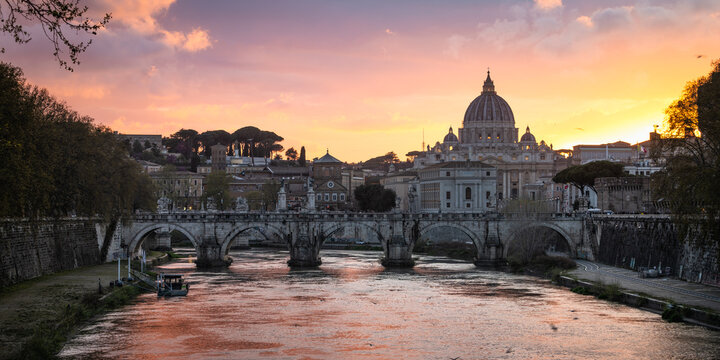 St Peter's Basilica and the river Tiber at sunset, Rome, Italy