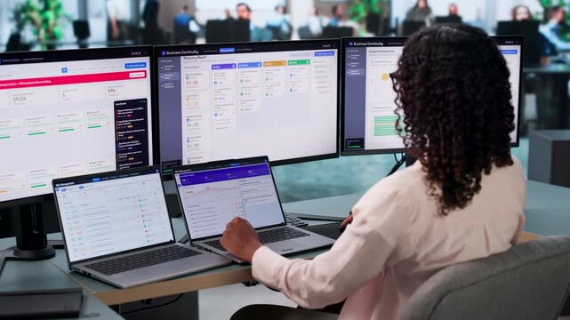 Business Analyst Monitors Real-time Software Dashboard Ensuring Operational