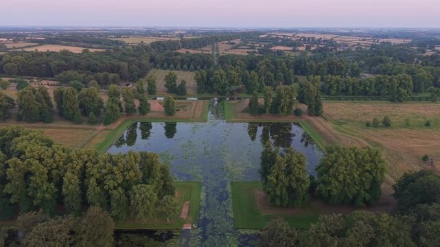 The historic waterways of Boughton House, a 17th-century estate in Northamptonshire, England, located just a few miles from Kettering.