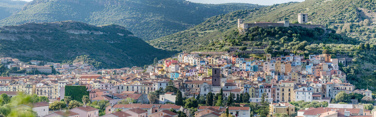 Naklejka premium colorful picturesque traditional buildings and Malaspina castle, Bosa, Oristano, Italy
