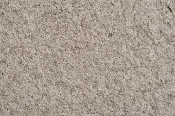 Close up of beige felt fabric texture background © Hvkk