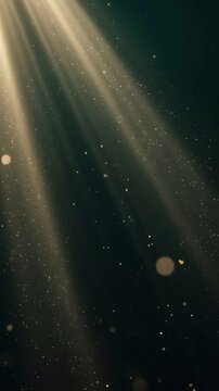 Cinematic golden light beams revealing floating dust particles in dark space