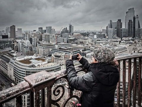Tourists photographing the London skyline from Saint Paul's Cathedral, London, England, Great Britain, Europe
