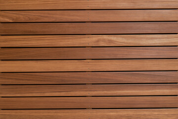 Exterior Grade Real Wood Decking Planks with Fasteners in Straight Linear Pattern Background © Hvkk