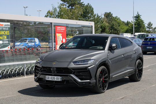Nancy, France - July 4th 2026 : View on a purple Lamborghini Urus parked on a parking lot.