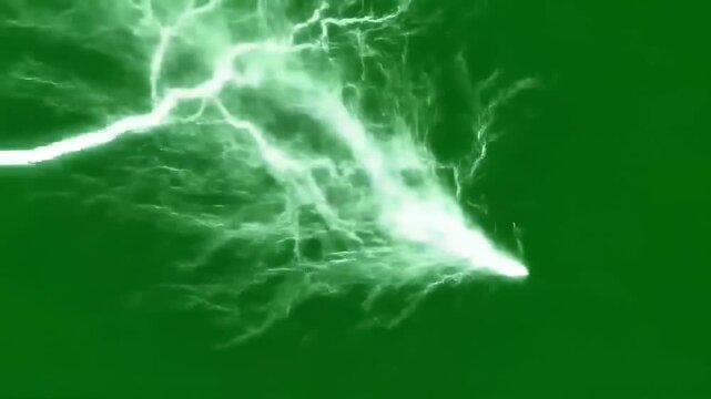 Brilliant white lightning bolts crackling across a vibrant green background, powerful natural energy discharge, storm, electricity