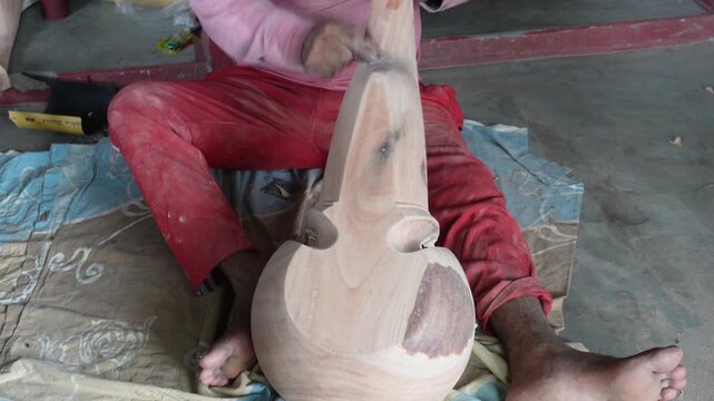 Artisan Carving Wooden Sculpture by Hand