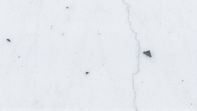 Engineered quartz slab texture with grazing light and cool blue