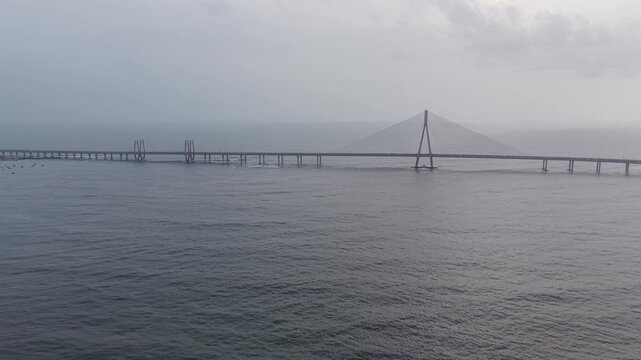 Cinematic drone truck right angled shot along the Bandra Worli Sea Link bridge, Mumbai